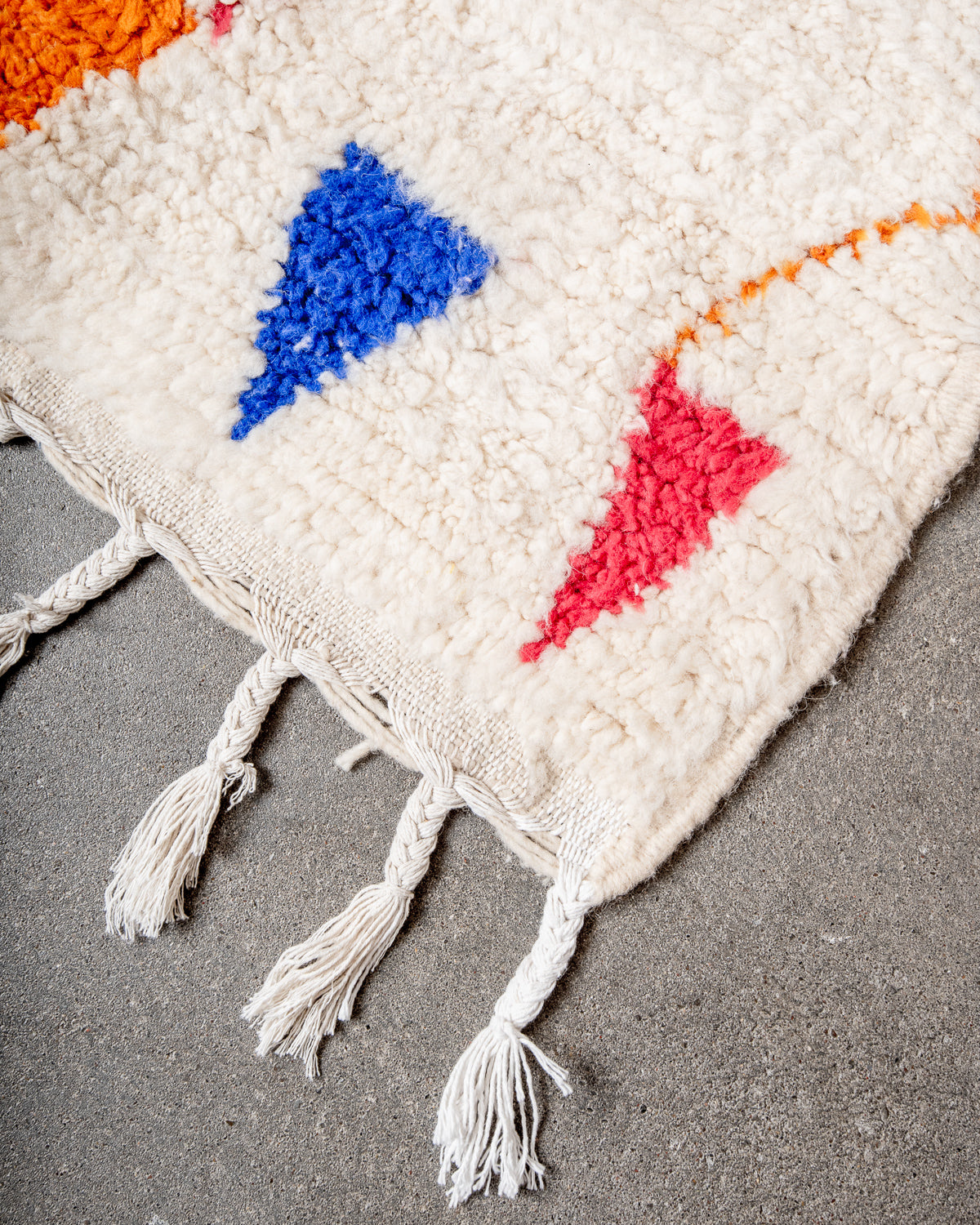 Modern, designer, handcrafted Berber rug from Morocco. Beniourain carpet with beautiful colours and patterns and fluffy wool texture.
